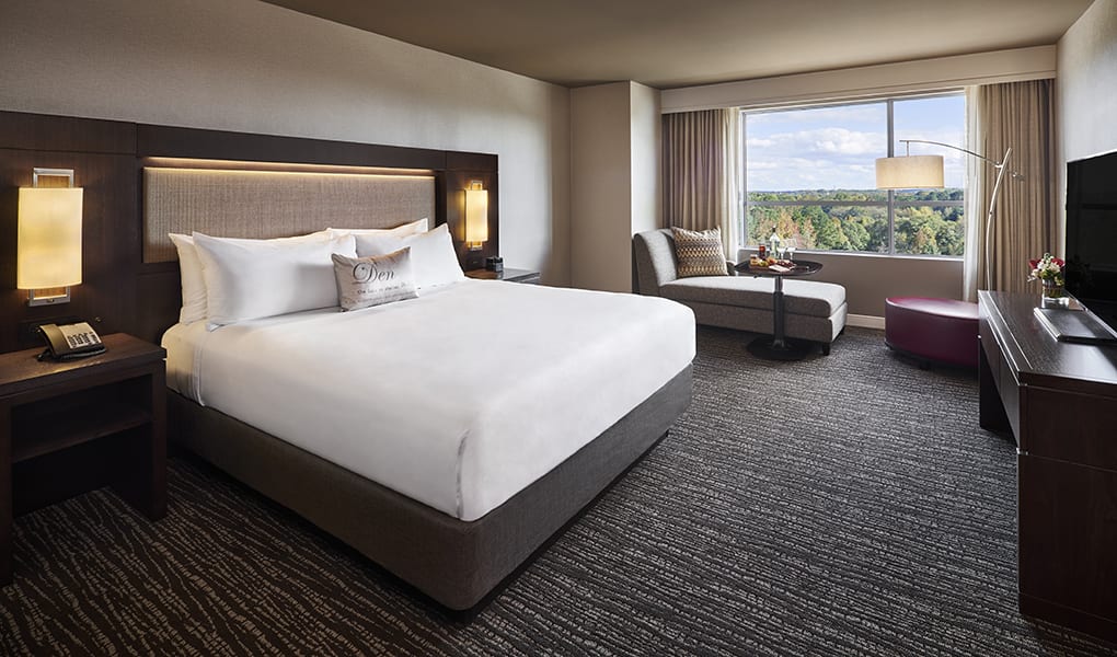 Hotel room with comfortable king bed and amenities